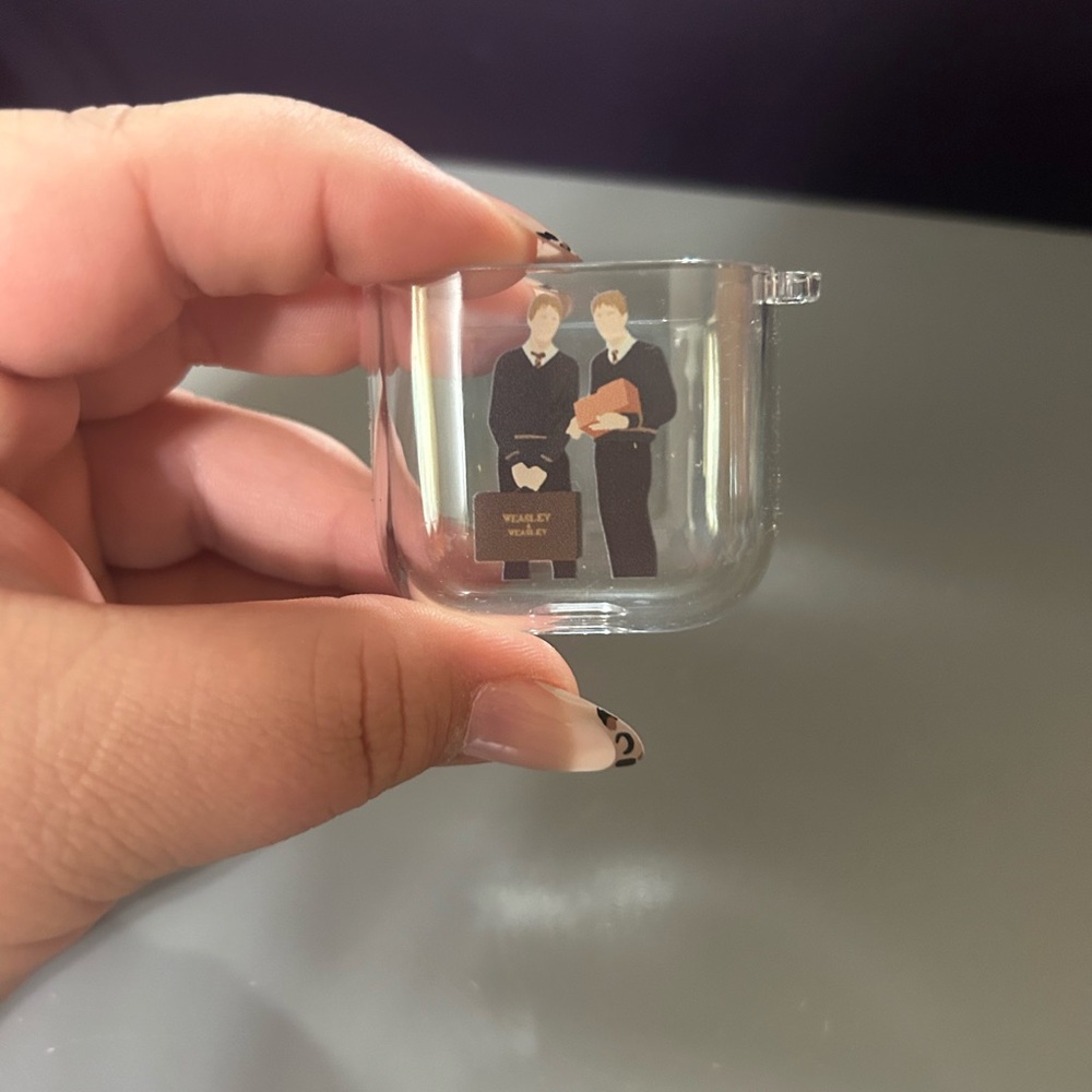 Clear AirPods case with Weasley Twins & HP cards